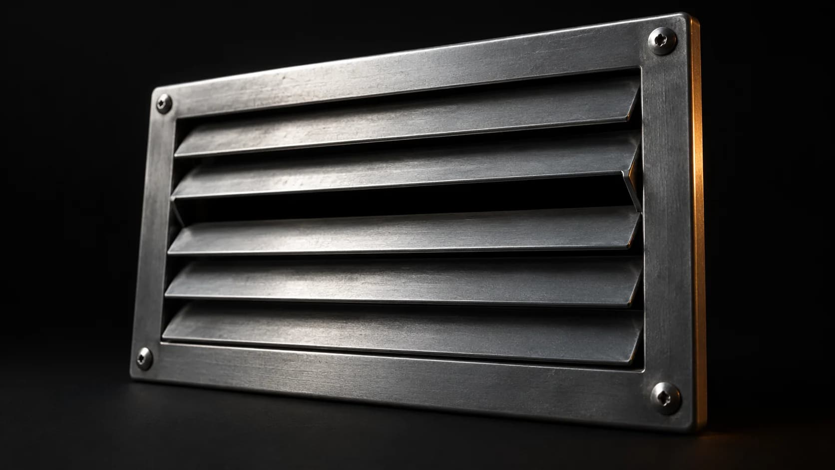 Steel ventilation grille with one open slot.